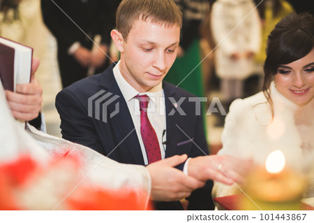 Wedding couple bide and groom get married in a church 101443867