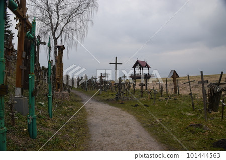 Lithuania Hill of Crosses on a slightly cloudy day Lithuania Hill of Crosses on a slightly cloudy day 101444563