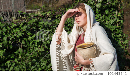 Girl with a pot in ancient clothes Girl with a pot in ancient clothes 101445341