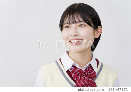 Smiling high school girl White background 101447371