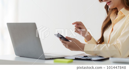 Beautiful American woman completes KYC using an online banking program in order to open a digital savings account. The definition of cyber security Beautiful American woman completes KYC using an online banking program in order to open a digital savings account. The definition of cyber security 101447848