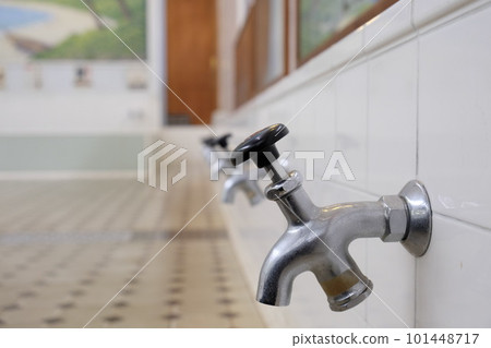 An image of a public bath (a washroom with a painting of Mt. Fuji in the background) An image of a public bath (a washroom with a painting of Mt. Fuji in the background) 101448717