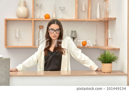 Modern girl with glasses, brunette in glasses posing at the camera, fashion, confident woman in glasses businesswoman 101449134