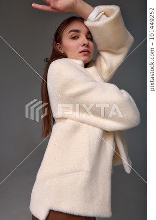 A beautiful business woman in a fur coat on a light background, a photo for a marketplace, a product demonstration, artificial fur, a girl posing in a fur coat made of artificial fur A beautiful business woman in a fur coat on a light background, a photo for a marketplace, a product demonstration, artificial fur, a girl posing in a fur coat made of artificial fur 101449252