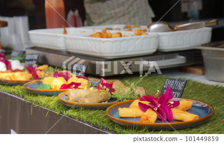 Asian dishes displayed at street food market Asian dishes displayed at street food market 101449859