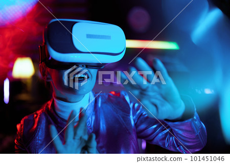 smiling trendy woman in vr headset designing virtual reality 101451046