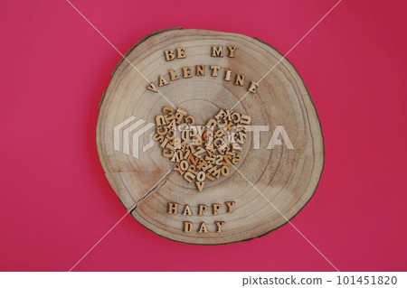 Alphabet letters on wooden square pieces forming heart shape Alphabet letters on wooden square pieces forming heart shape 101451820