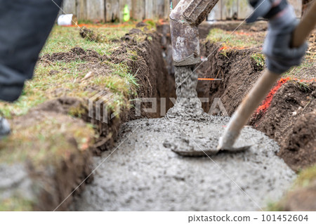concreting from the pipe of the cement mixing car concreting from the pipe of the cement mixing car 101452604