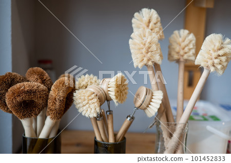 Eco brushes made of coconut. Household products without plastic waste in an eco friendly store 101452833