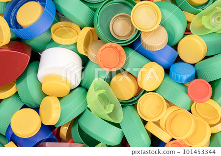 Variety of colorful plastic screw caps background 101453344