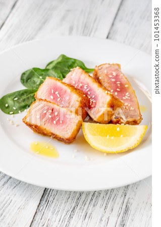 Sliced tuna steak Sliced tuna steak 101453368