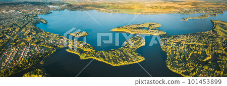 Lyepyel, Lepel Lake, Beloozerny District, Vitebsk Region. Aerial View Of Lyepyel Cityscape Skyline In Autumn Morning. Morning Fog Above Lepel Lake. Top View Of European Nature From High Attitude In Lyepyel, Lepel Lake, Beloozerny District, Vitebsk Region. Aerial View Of Lyepyel Cityscape Skyline In Autumn Morning. Morning Fog Above Lepel Lake. Top View Of European Nature From High Attitude In 101453899