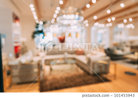 Home accessories and household products in store of shopping centre. View of home accessories for living room in shop fashion retail store. Sofa with pillows. Abstract blur blurred boke bokeh Home accessories and household products in store of shopping centre. View of home accessories for living room in shop fashion retail store. Sofa with pillows. Abstract blur blurred boke bokeh 101453943
