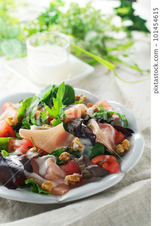 Tomato and raw ham salad Tomato and raw ham salad 101454615