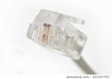 Cable with Rj 11 plug for a telephone line on a white background 101455797