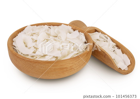 Coconut flakes or chips in wooden bowl isolated on white background with full depth of field 101456373
