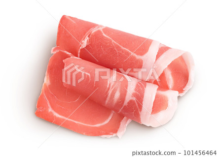 Italian prosciutto crudo or spanish jamon. Raw ham isolated on white background with full depth of field. Top view. Flat lay Italian prosciutto crudo or spanish jamon. Raw ham isolated on white background with full depth of field. Top view. Flat lay 101456464