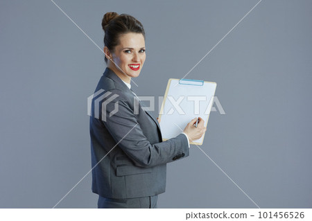 happy modern business woman isolated on grey happy modern business woman isolated on grey 101456526