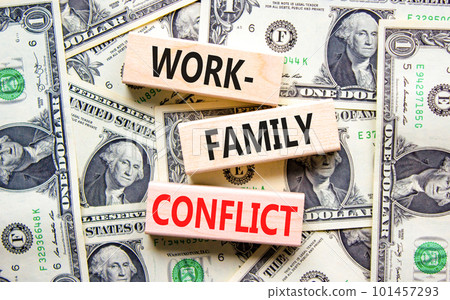 Work-family conflict symbol. Concept words Work-family conflict on wooden block on a beautiful background from dollar bills. Dollar bills. Business work-family conflict concept. Copy space. Work-family conflict symbol. Concept words Work-family conflict on wooden block on a beautiful background from dollar bills. Dollar bills. Business work-family conflict concept. Copy space. 101457293