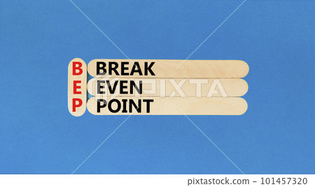 BEP break even point symbol. Concept words BEP break even point on wooden stick on a beautiful blue table blue background. Business and BEP break even point concept. Copy space. BEP break even point symbol. Concept words BEP break even point on wooden stick on a beautiful blue table blue background. Business and BEP break even point concept. Copy space. 101457320