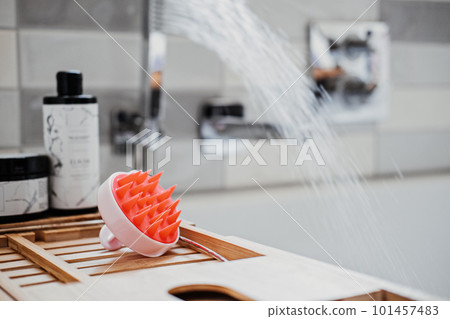 Shampoo Brush. Silicone Exfoliator Massager brush for circulation and follicle stimulation for optimal scalp health. Silicone Scrubber in the bathroom Shampoo Brush. Silicone Exfoliator Massager brush for circulation and follicle stimulation for optimal scalp health. Silicone Scrubber in the bathroom 101457483