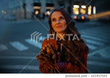 relaxed trendy woman in brown trench coat relaxed trendy woman in brown trench coat 101457501