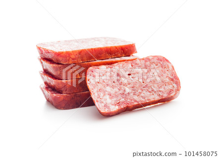 Smoked .sausage. Sliced salami isolatd on white background. 101458075