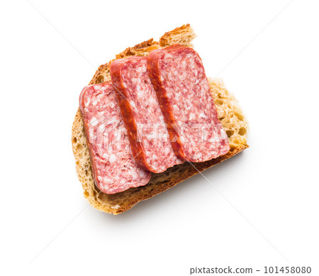 Smoked sausage. Sliced salami and bread isolatd on white background. Smoked sausage. Sliced salami and bread isolatd on white background. 101458080