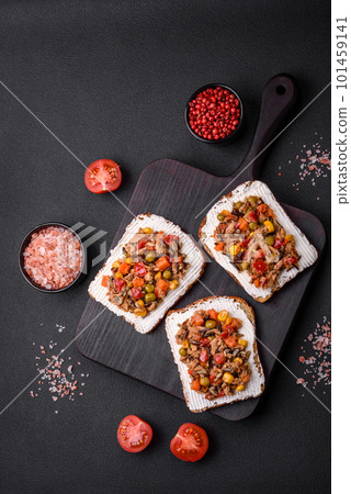 Delicious veggie sandwiches with canned tuna and mexican mix Delicious veggie sandwiches with canned tuna and mexican mix 101459141