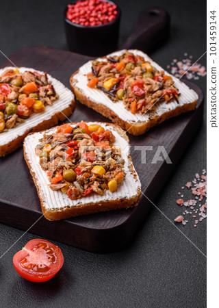 Delicious veggie sandwiches with canned tuna and mexican mix Delicious veggie sandwiches with canned tuna and mexican mix 101459144