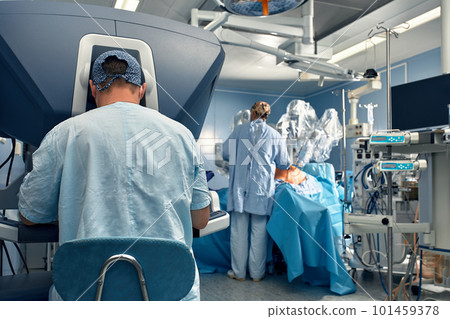 Surgery Da Vinci. Minimally invasive robotic surgery with the da Vinci surgical system. medical robot. Robotic Surgery. Robot-assisted medical operation. Medical operation involving robot. Surgery Da Vinci. Minimally invasive robotic surgery with the da Vinci surgical system. medical robot. Robotic Surgery. Robot-assisted medical operation. Medical operation involving robot. 101459378