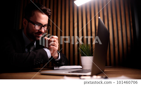 A young guy, a programmer or an entrepreneur i behind a laptop. A young guy, a programmer or an entrepreneur i behind a laptop. 101460706
