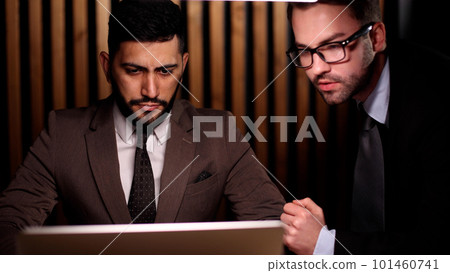 business colleagues sitting at the table in the office business colleagues sitting at the table in the office 101460741