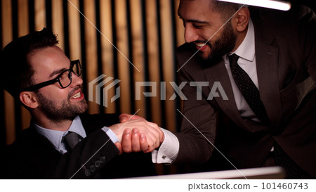 View from the handshake of business partners View from the handshake of business partners 101460743