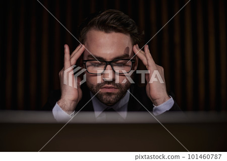 You shouldnt have to think twice about going online. a handsome young businessman sitting behind his laptop in his office. 101460787