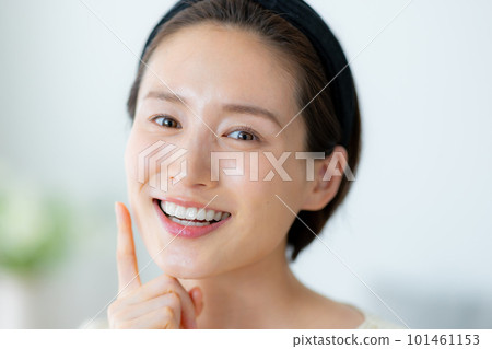A young woman doing skin care A young woman doing skin care 101461153