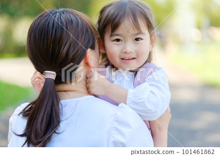A mother hugging a girl A mother hugging a girl 101461862