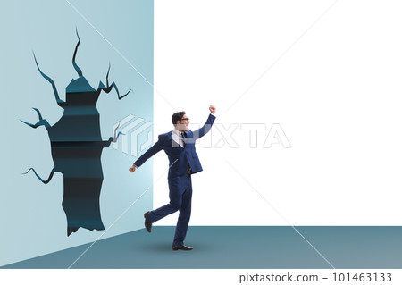 Businessman breaking through the wall Businessman breaking through the wall 101463133