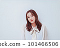 young woman in white blouse 101466506