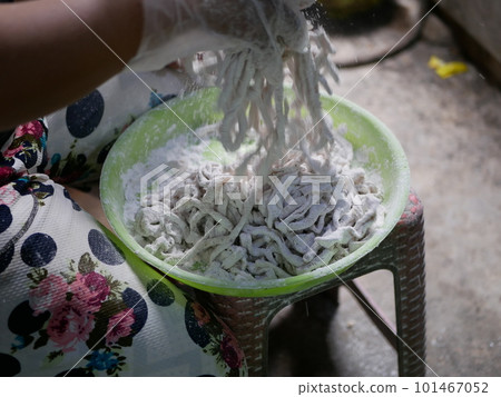 Making keripik usus ayam or chicken intestine crisphy at home. is a processed chicken intestine that is made into chips. It tastes savory and has a crunchy texture that can be used as a snack. 101467052