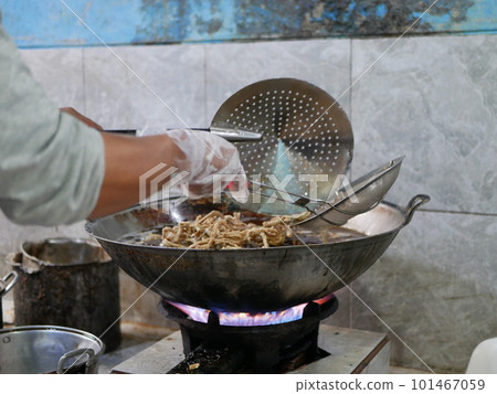 Making keripik usus ayam or chicken intestine crisphy at home. is a processed chicken intestine that is made into chips. It tastes savory and has a crunchy texture that can be used as a snack. Making keripik usus ayam or chicken intestine crisphy at home. is a processed chicken intestine that is made into chips. It tastes savory and has a crunchy texture that can be used as a snack. 101467059