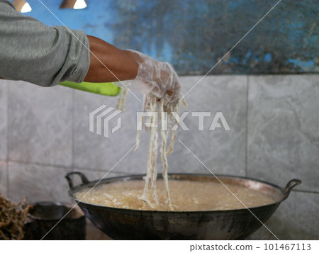 Making keripik usus ayam or chicken intestine crisphy at home. is a processed chicken intestine that is made into chips. It tastes savory and has a crunchy texture that can be used as a snack. 101467113