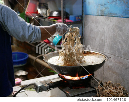 Making keripik usus ayam or chicken intestine crisphy at home. is a processed chicken intestine that is made into chips. It tastes savory and has a crunchy texture that can be used as a snack. Making keripik usus ayam or chicken intestine crisphy at home. is a processed chicken intestine that is made into chips. It tastes savory and has a crunchy texture that can be used as a snack. 101467118