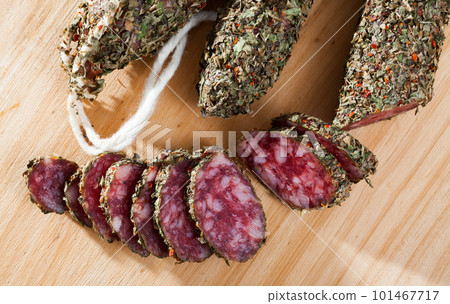 Catalan sausage fuet in herbs 101467717