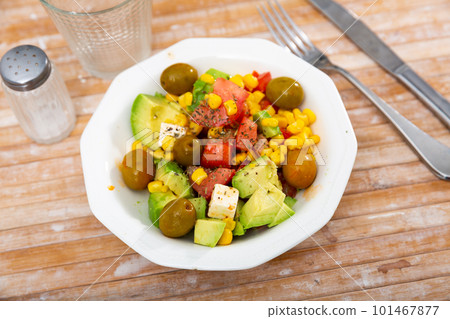 Easy salad with vegetables and fresh cheese 101467877