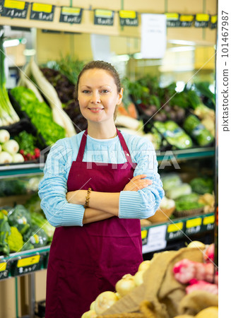 vegetable saleswoman in supermarket vegetable saleswoman in supermarket 101467987