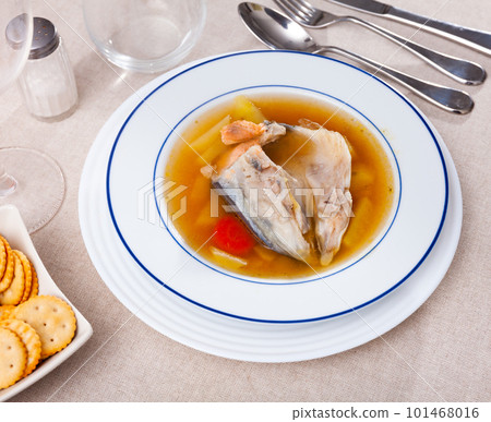 Fish soup with salmon bones and vegetables 101468016
