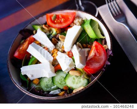 cuisine spanish salad with cheese and quinoa for breakfast 101468248