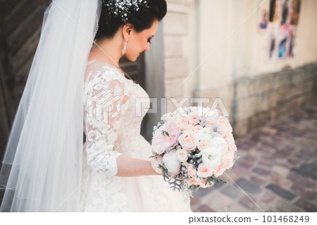 Wonderful luxury wedding bouquet of different flowers Wonderful luxury wedding bouquet of different flowers 101468249