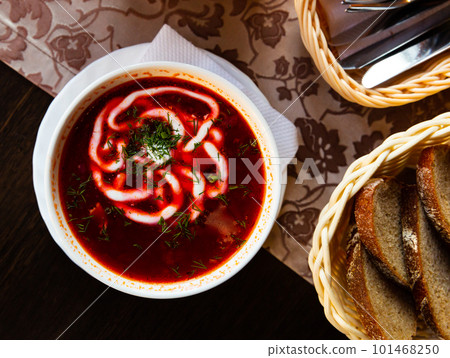 Russian borsch red soup with meat and sour cream 101468250